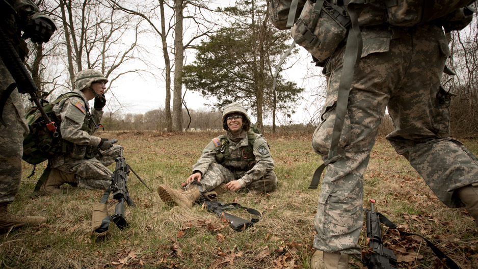 ROTC students in fatigues gathering during a training session at Fort Dix