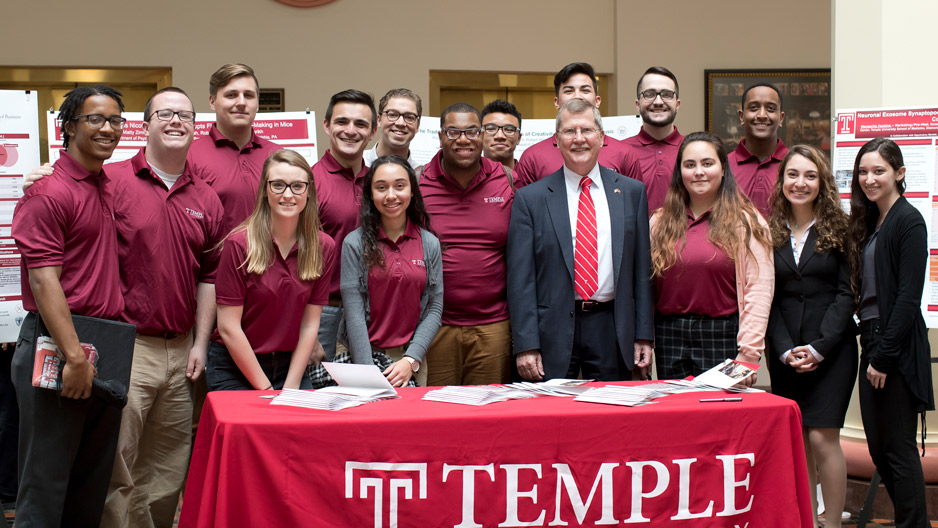 Temple students pose with university President Richard M. Englert in Harrisburg.