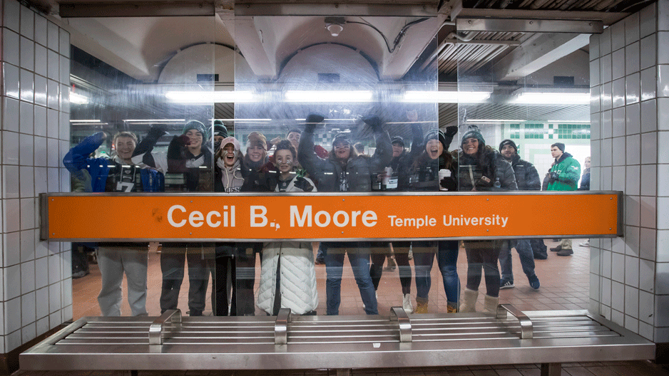 Fans wait at the Cecil B. Moore subway station