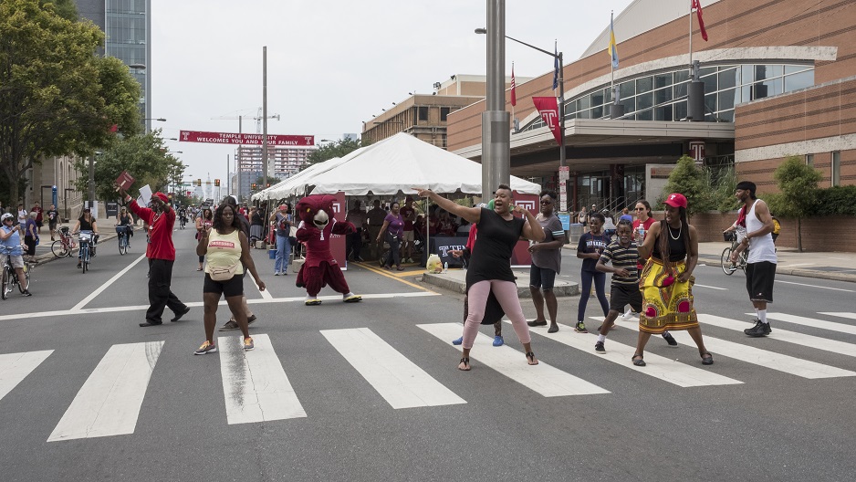 People dancing on North Broad Street as part of Temple's Camp T programming. 