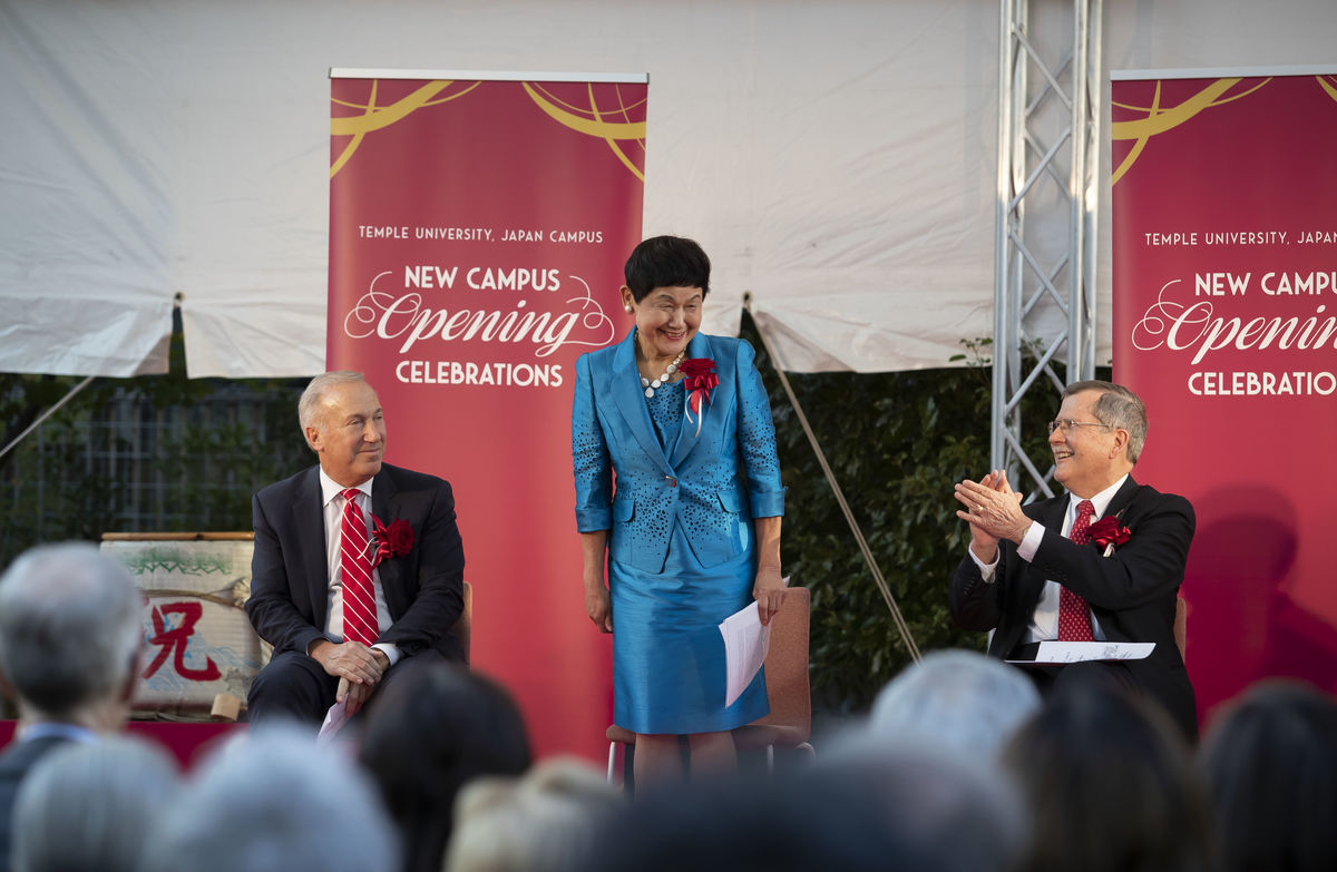 Mariko Bando, chancellor of Showa Women's University sits on stage with Temple University leadership. 
