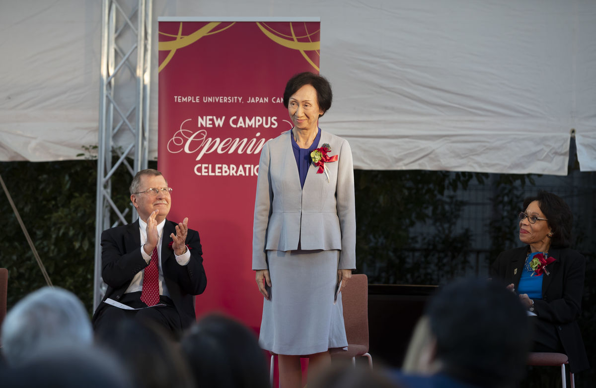 Tomoko Kaneko, president of Showa Women's University stands on stage with Temple University leadership during the grand opening of TUJ's new campus celebrations in Tokyo. 