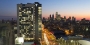 Morgan Hall and the Philadelphia skyline at sunset.