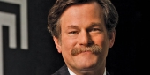 Larry R. Kaiser smiling.