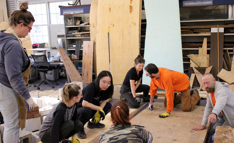 students working on the flower show exhibit