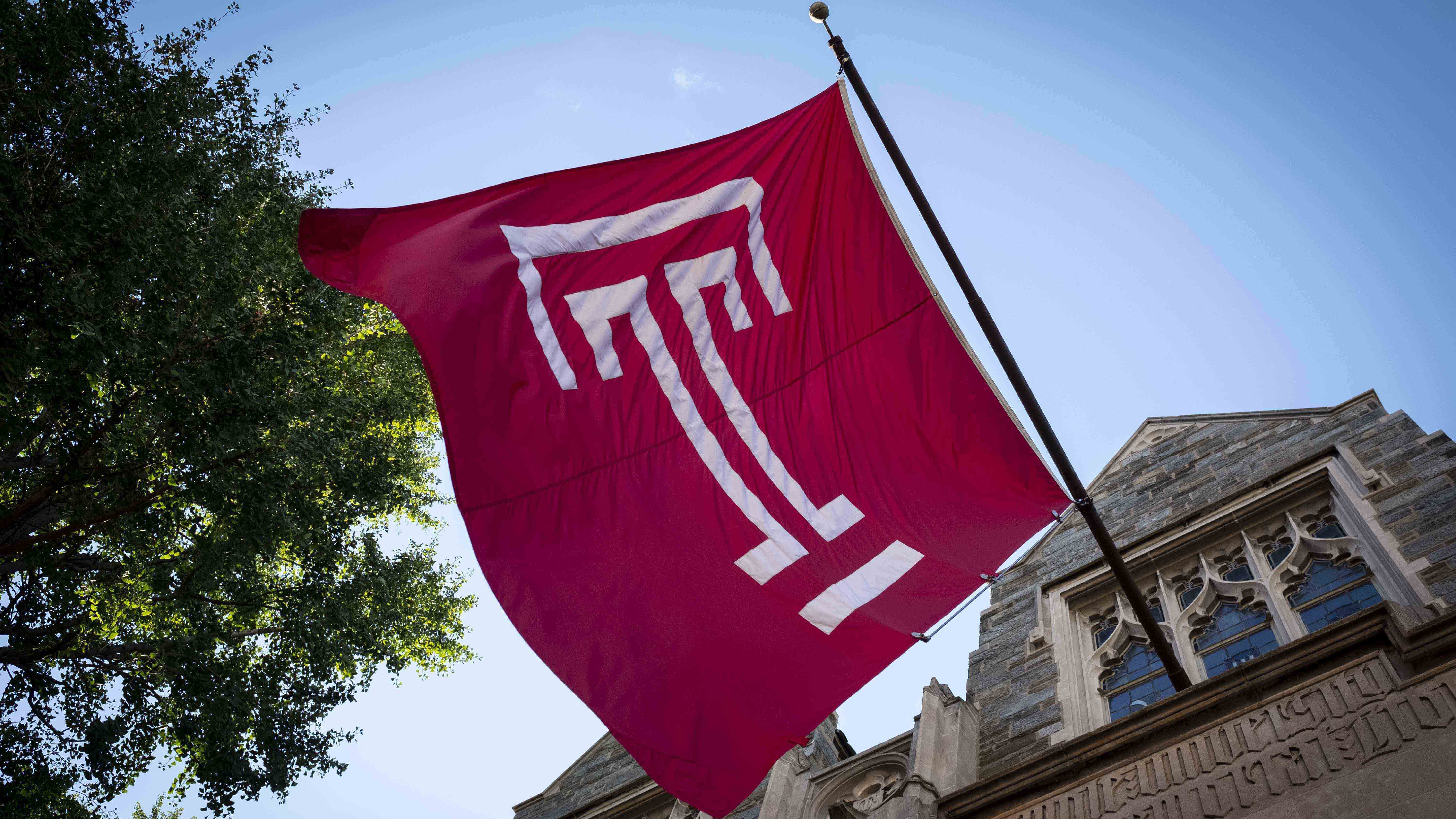 Temple flag outside Sullivan Hall