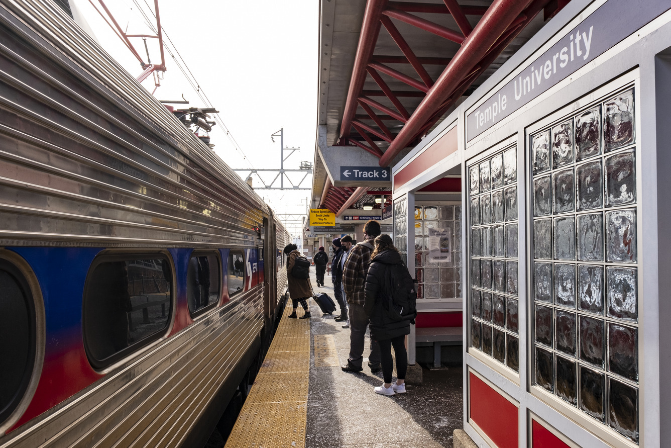 People boarding SEPTA Regional Rail at the Temple University station