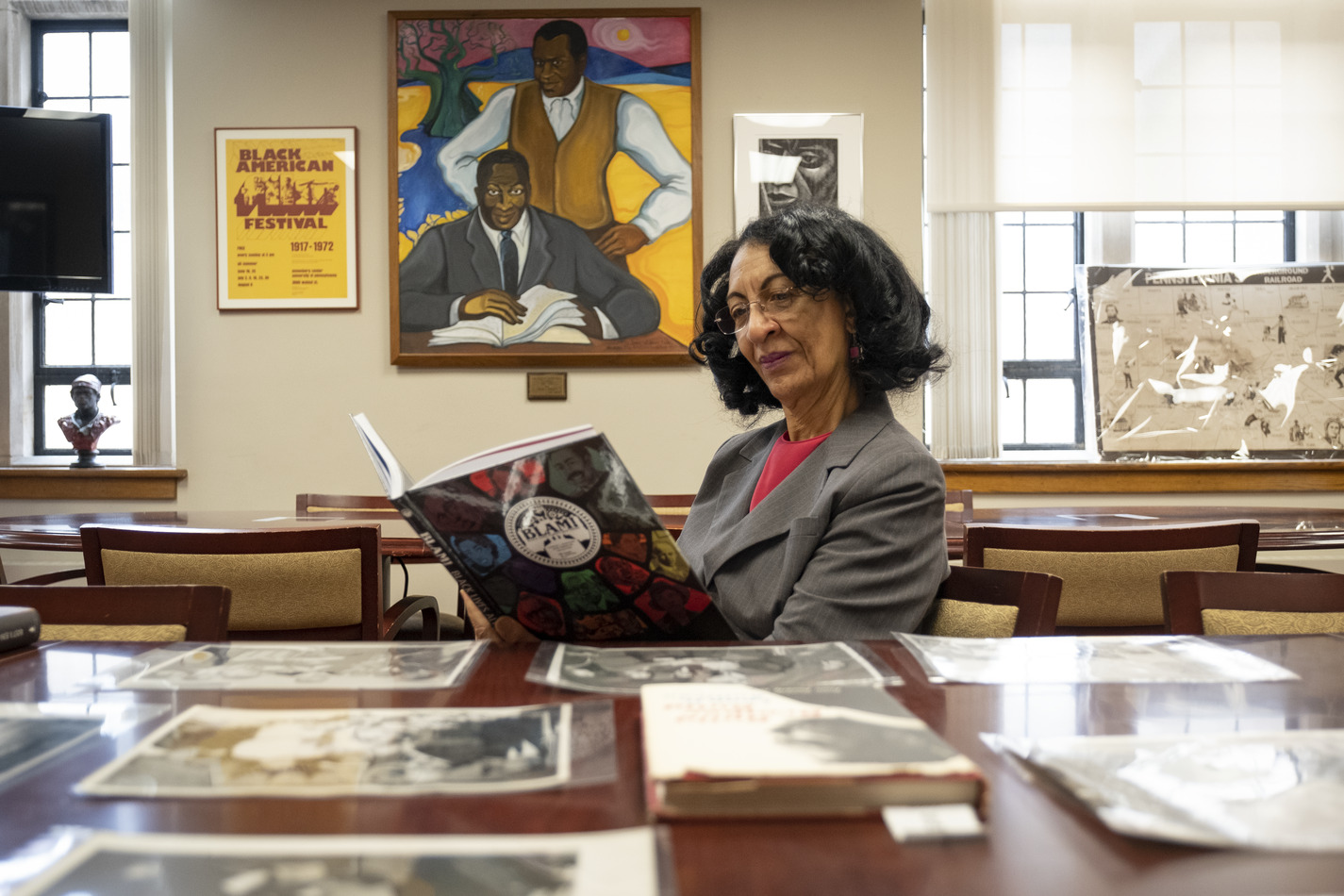 Diane Turner, curator of the Blockson Collection, reads a copy of the collection’s new graphic novel, “Black Lives Always Mattered!”