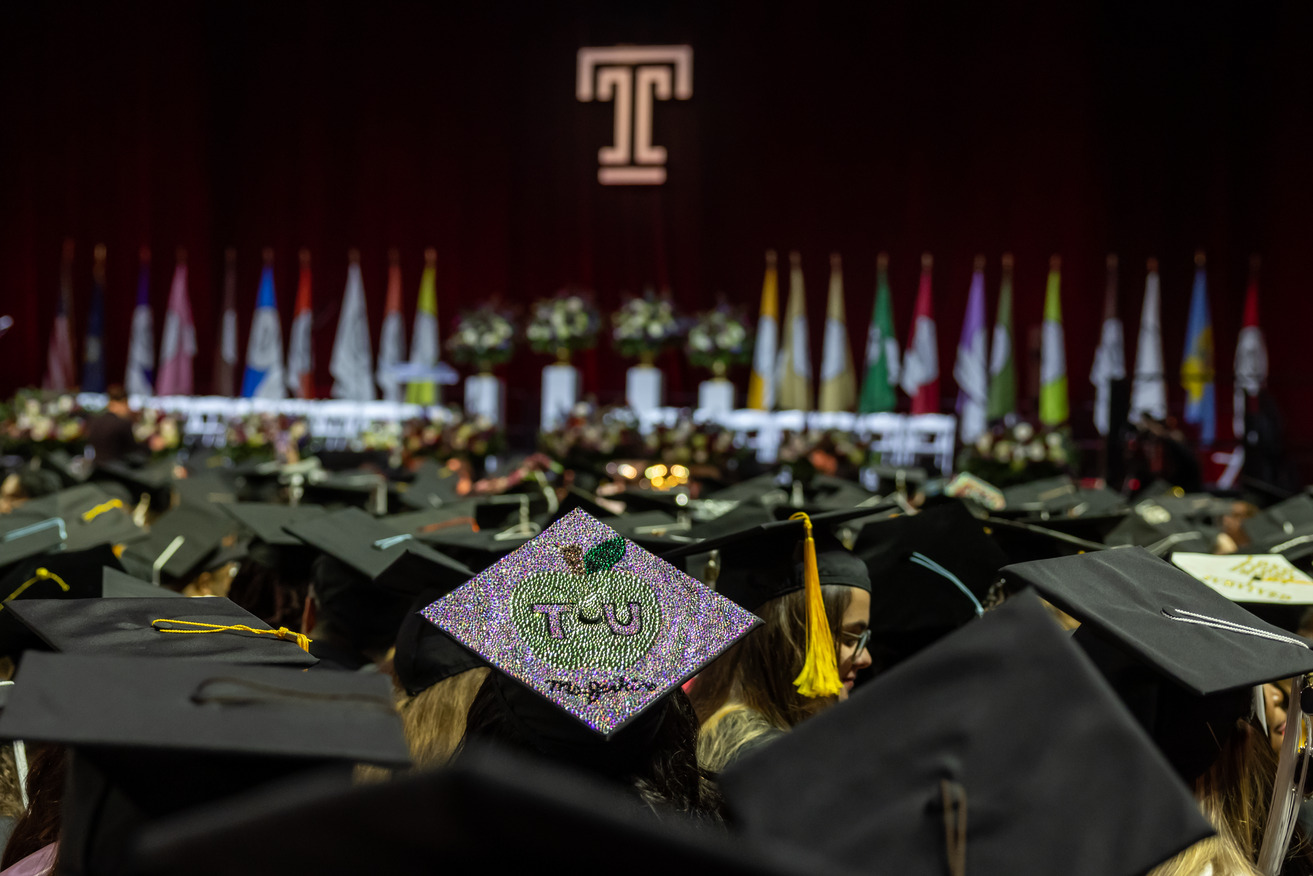 a graduation cap in a crowd of caps