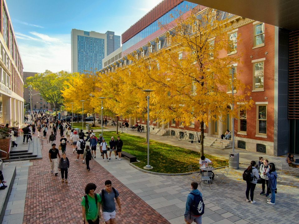 Students walking on Temples Main Campus in the fall