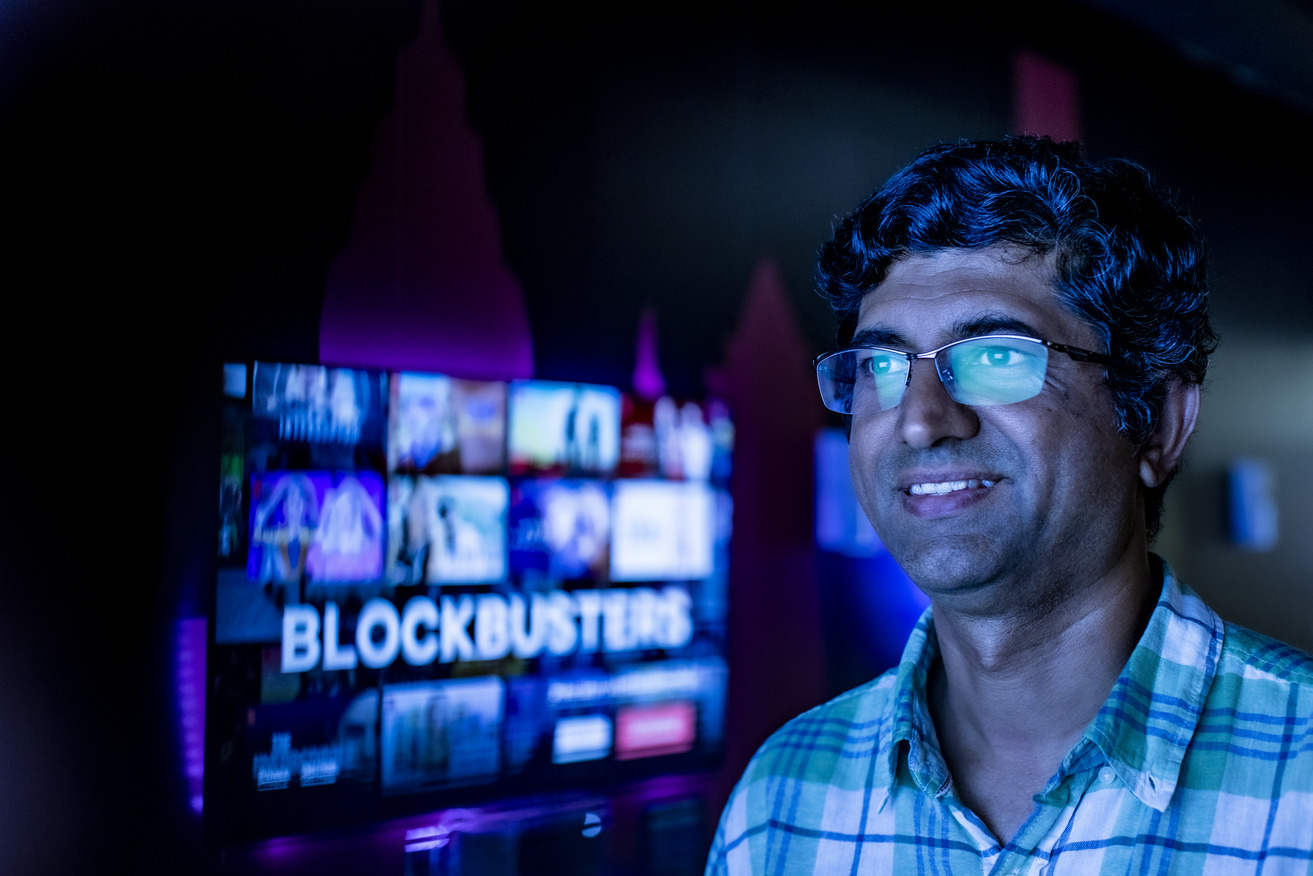 Vinod Venkatraman pictured with a Netflix screen behind him.