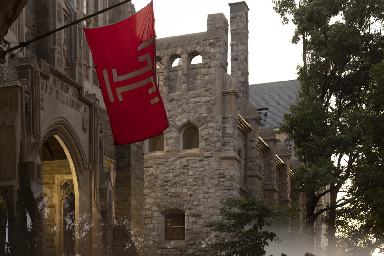 The Temple flag flying outside on Main Campus