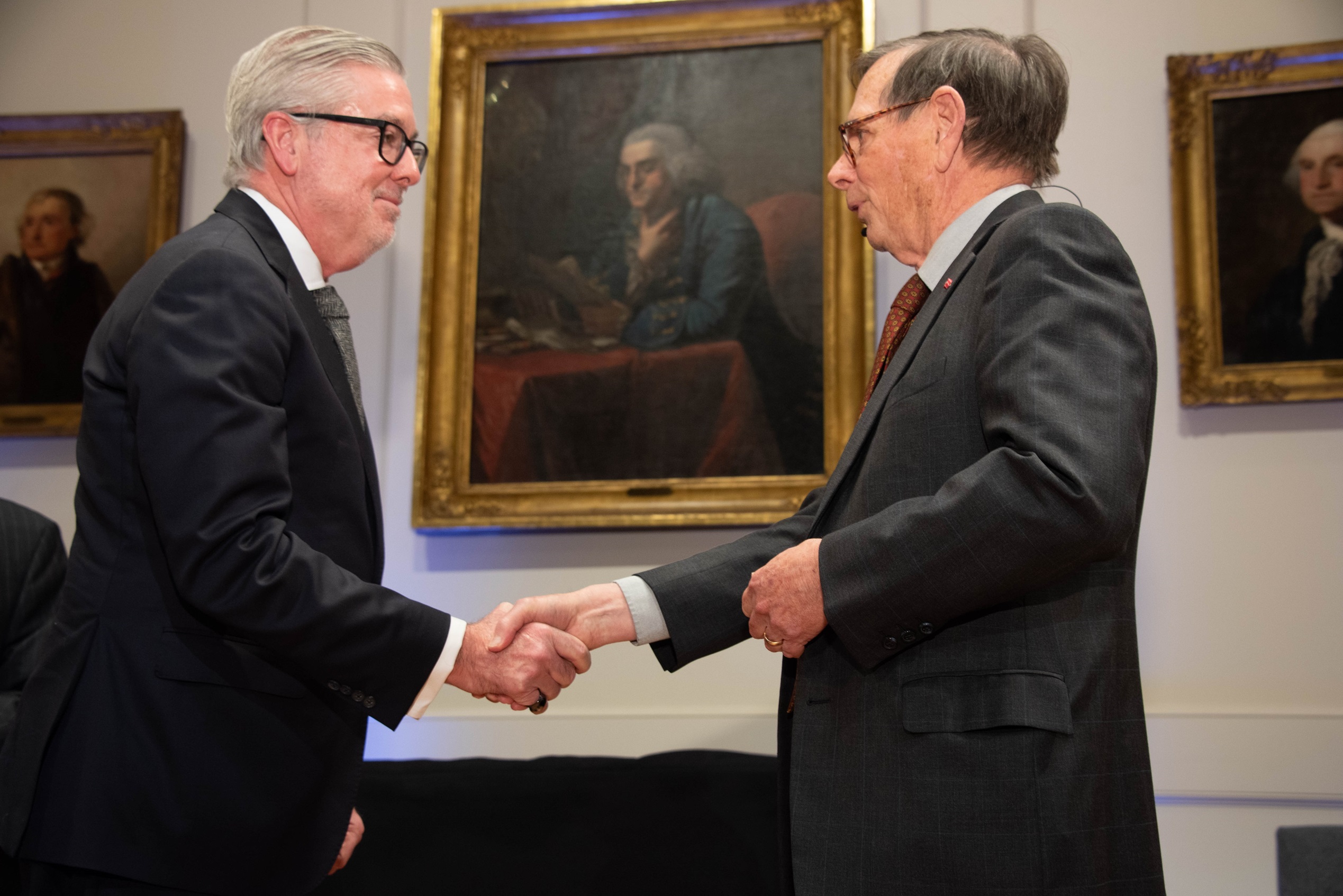 A picture of President John Fry being inducted into the American Philosophical Society.