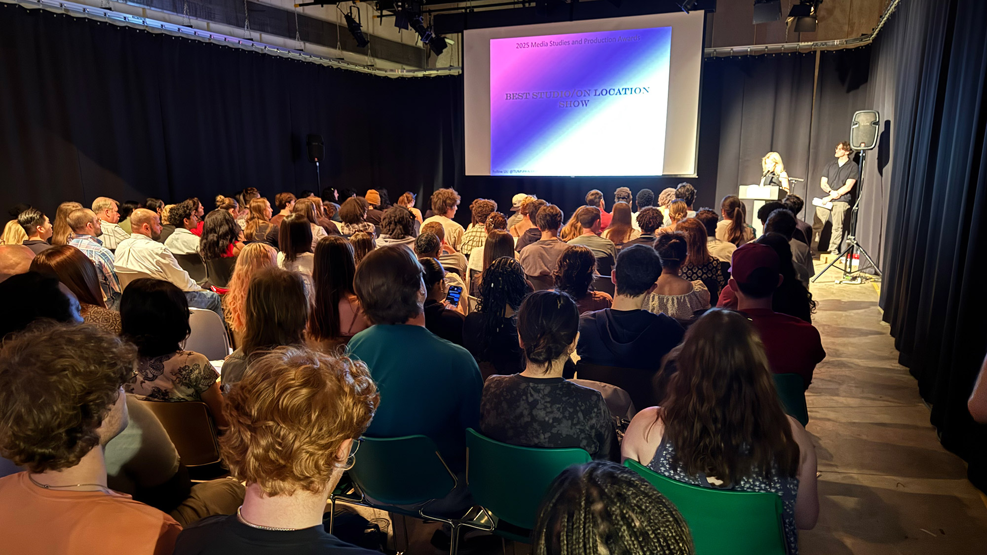 Students sitting at the award ceremony