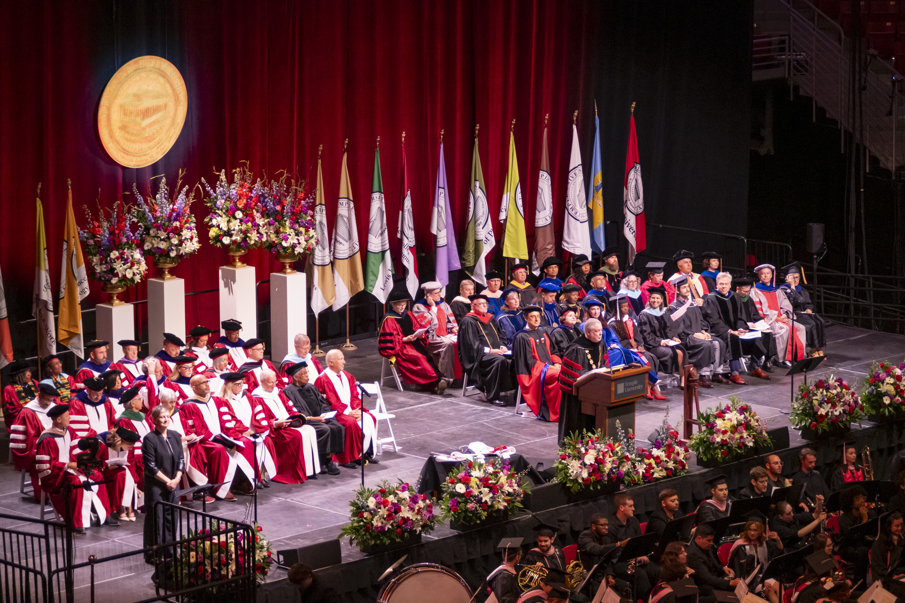 President Fry speaking at podium during Commencement