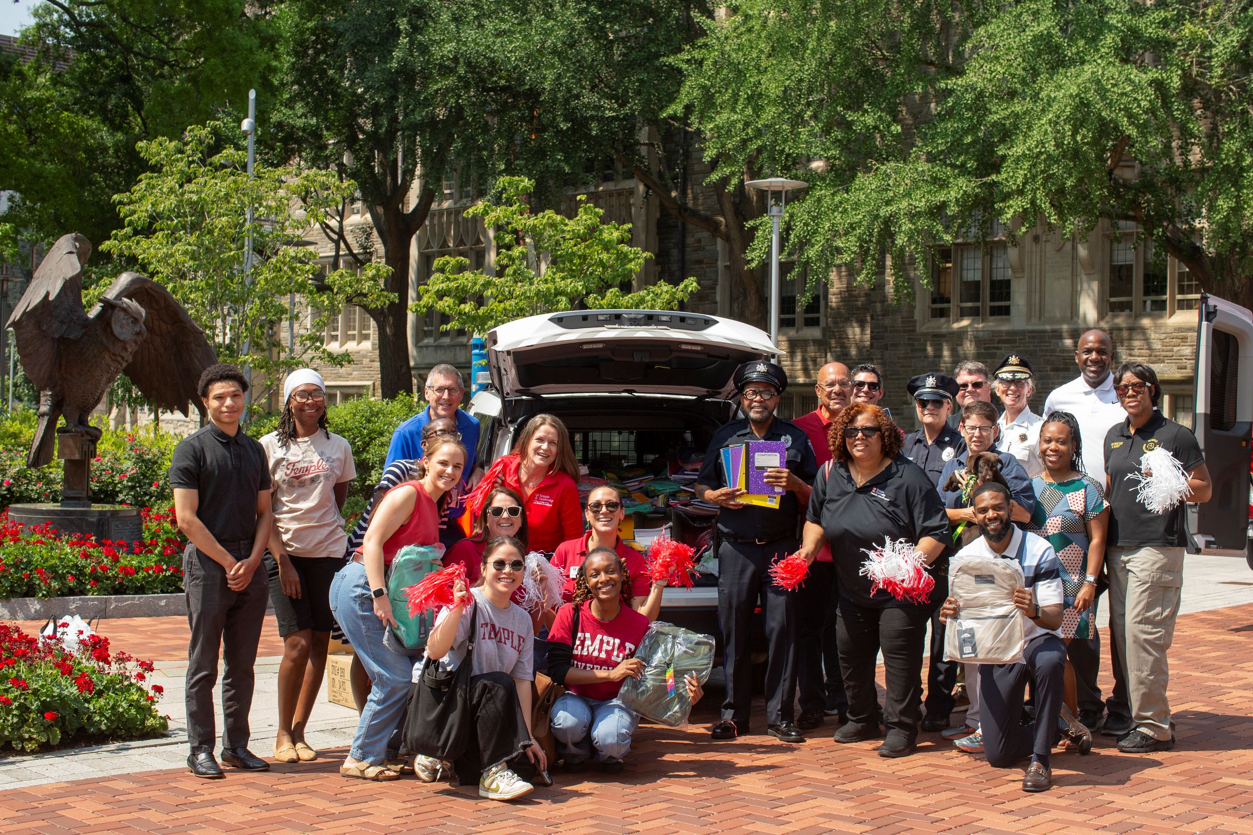Temple volunteers teamed up with the Department of Public Safety, College of Education and Human Development (CEHD) and the Office of Community Impact to collect and distribute 100 backpacks filled with school supplies to campers at the North Central Community Center.