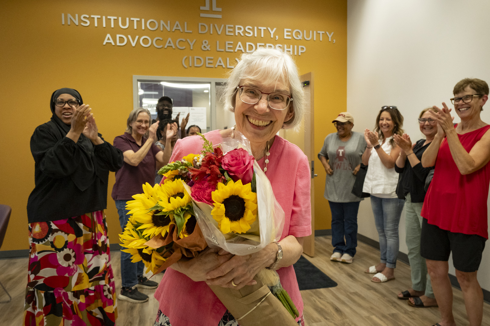 Sandra Foehl was officially accompanied on her way outside by colleagues during her last day at Temple. 