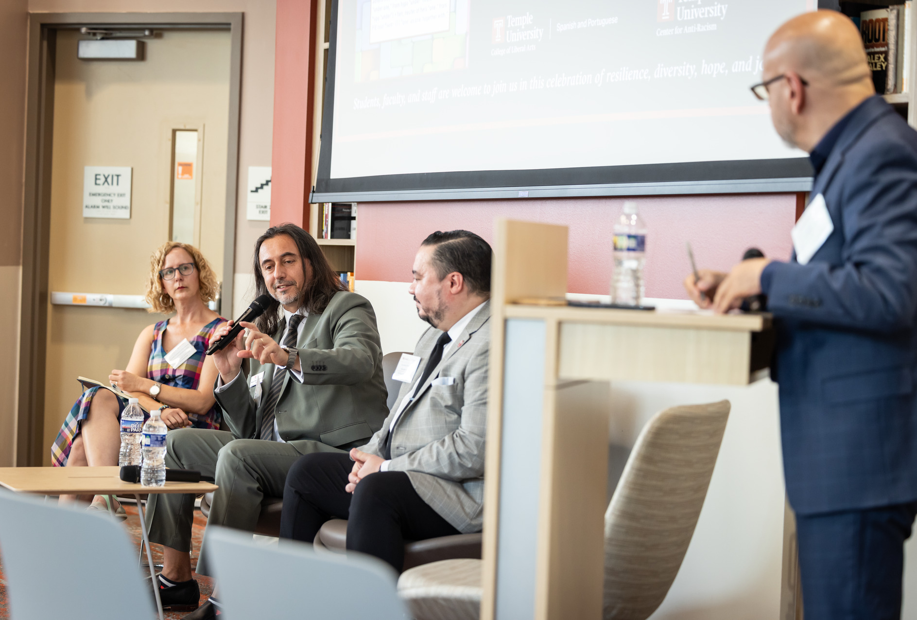 Miguel Mostafá, Mariola V. Alvarez and Michael Usino speaking in the Center for Anti-Racism