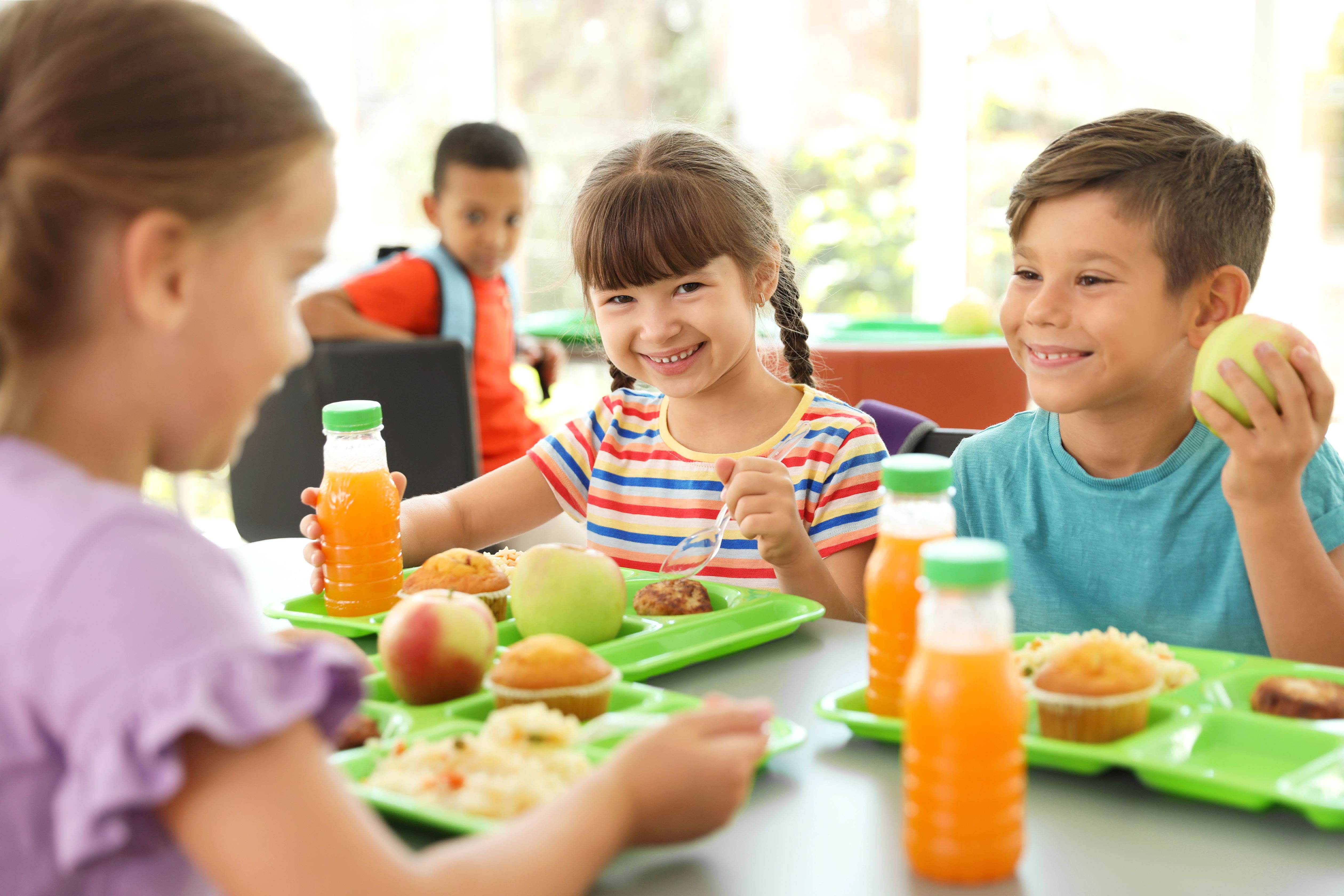 Children eating school lunch