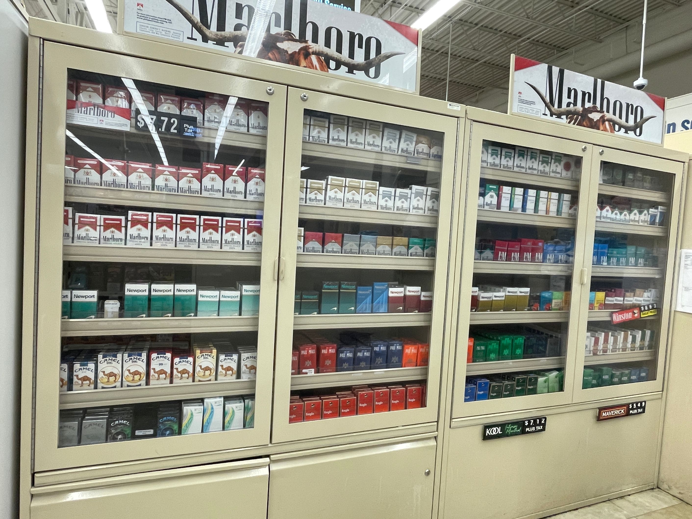 Beige locked cabinet containing tobacco products