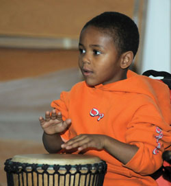 Learning to play the African drum