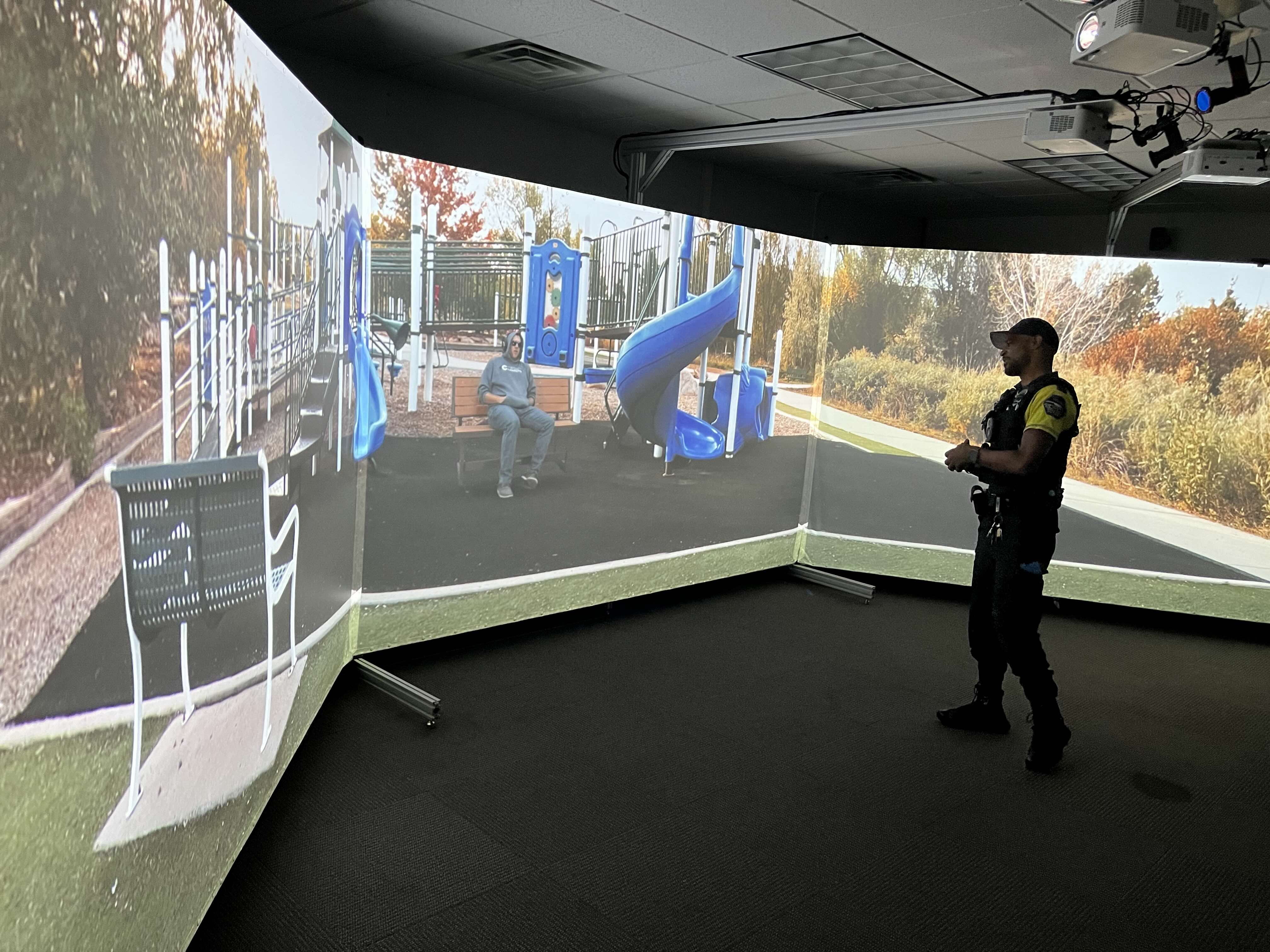 A Temple University police officer utilizes a new simulator for training.