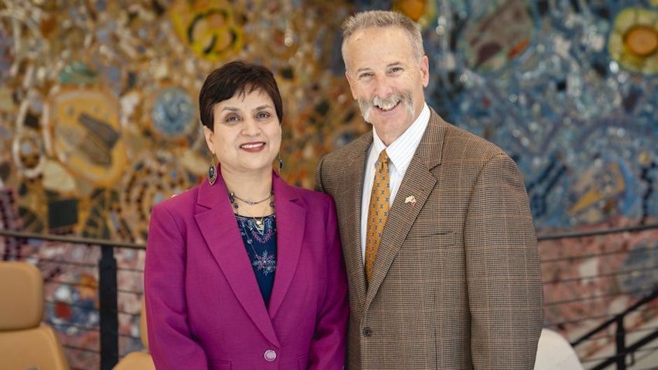 Amita Avadhani, chair of the Department of Nursing, and David R. Devereaux, a member of the College of Public Health Board of Visitors.