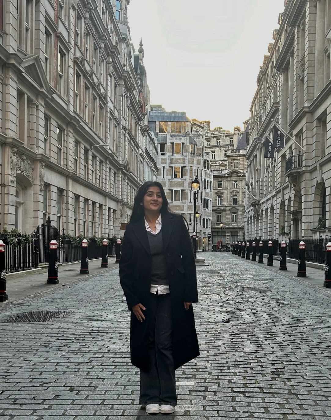 Samhitha Balaji stands on a London street