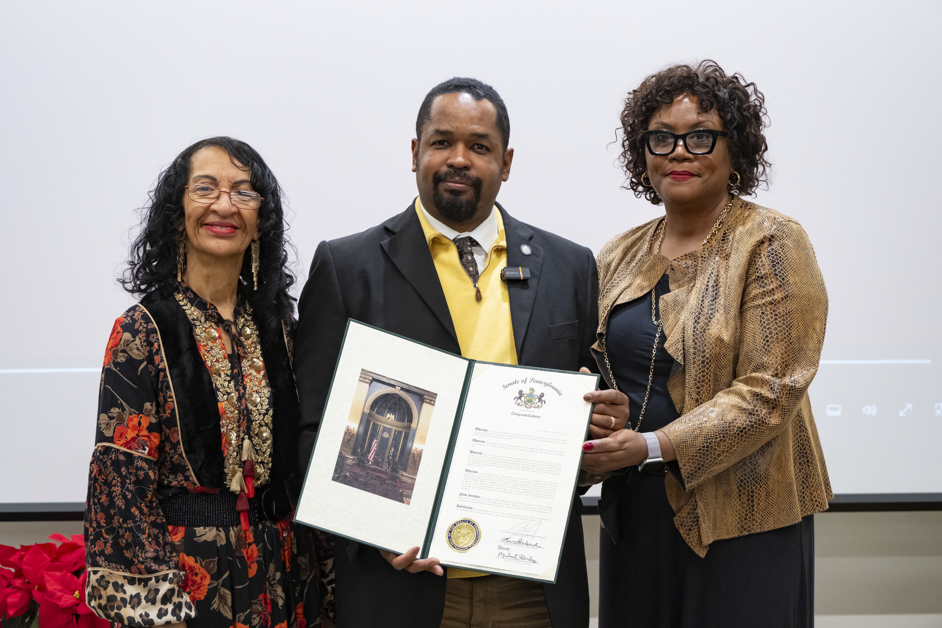 Diane Turner, curator of Charles L. Blockson Afro-American Collection; state Sen. Sharif Street and Noelle Blockson, Charles Blockson’s daughter, attend the collection’s 40th anniversary celebration. 