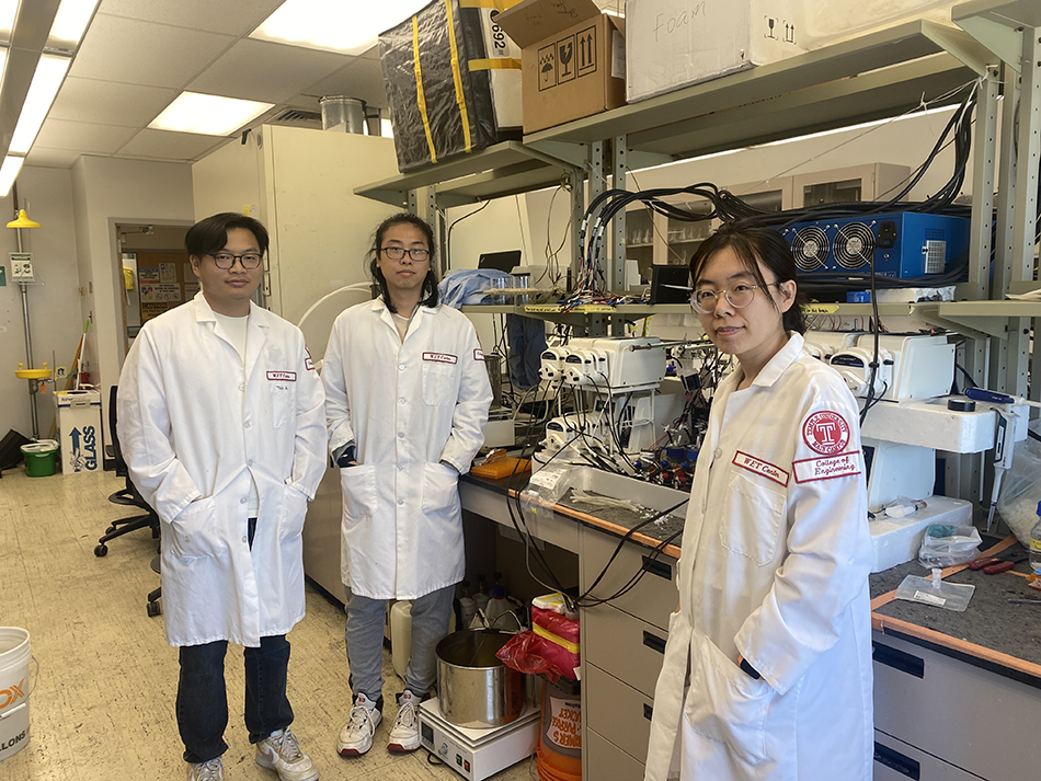 Three students in the Yuan Lab