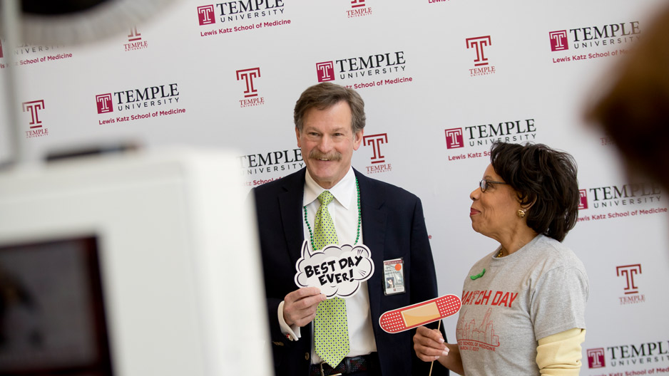 Temple medical school Dean Larry Kaiser and university Provost JoAnn Epps posing for a photo.