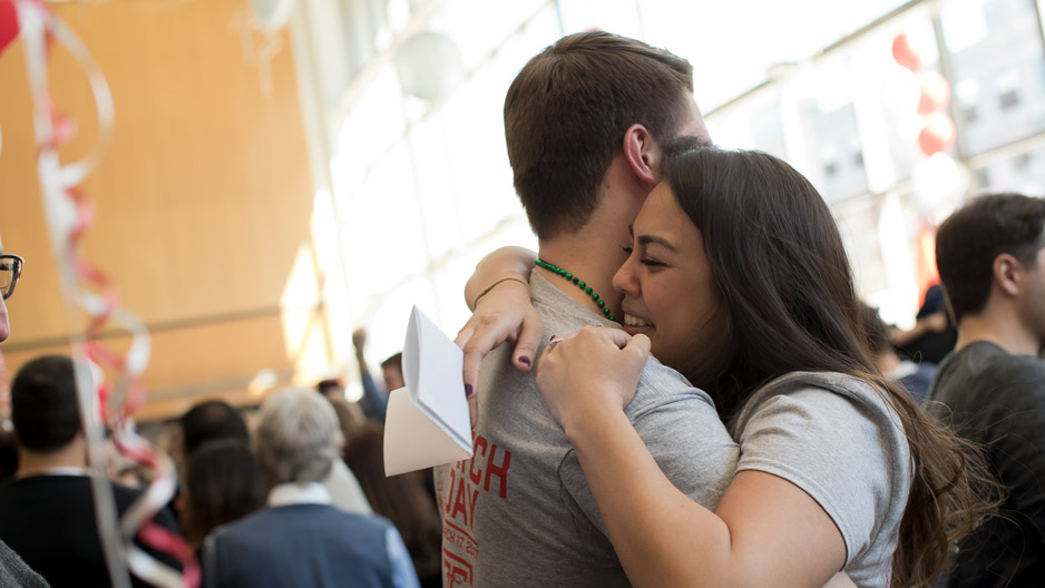 Chris Kyper and Becky Lacayo hugging.