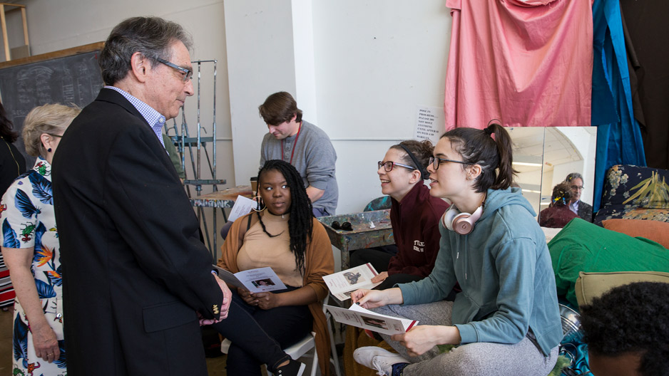 Stuart Holzer talking with students.