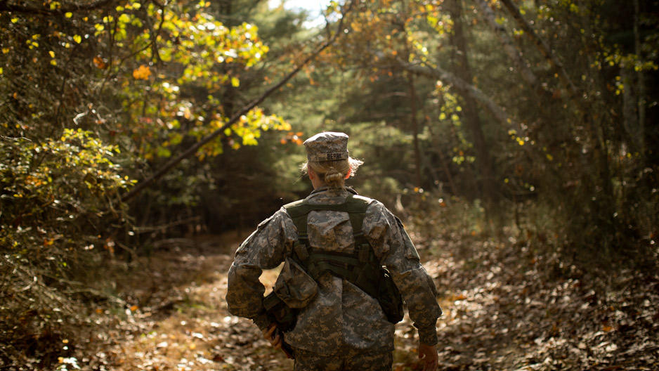 Katherine Berry in Army ROTC uniform during training in woods