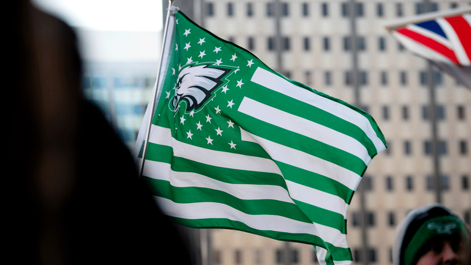 The Eagles logo and colors are transposed on an American flag