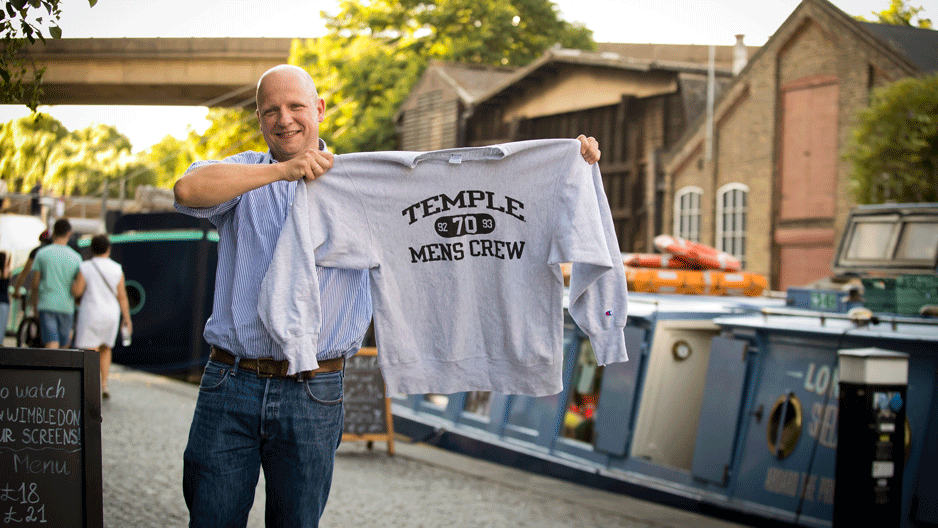 Alumnus Cyrill Rothermundt shows off his Temple Crew sweatshirt