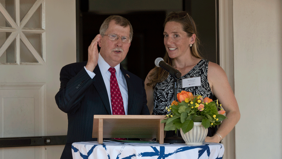 Richard Englert and Rebecca Grzybowski speak at the boathouse