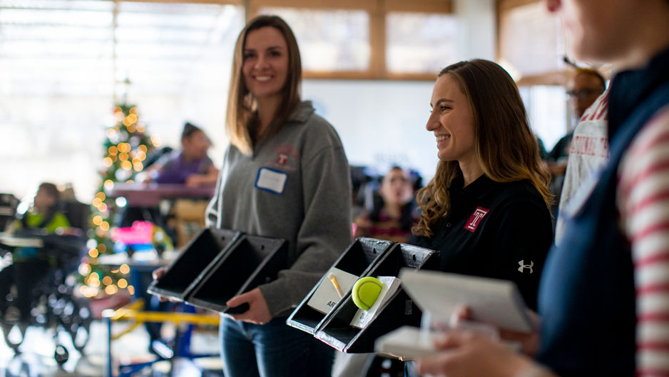 students presenting adaptive devices