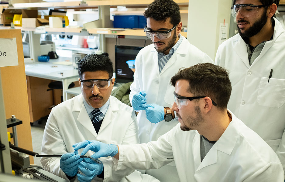engineering students working in the lab