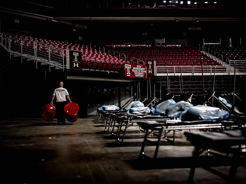 worker moving medical supplies