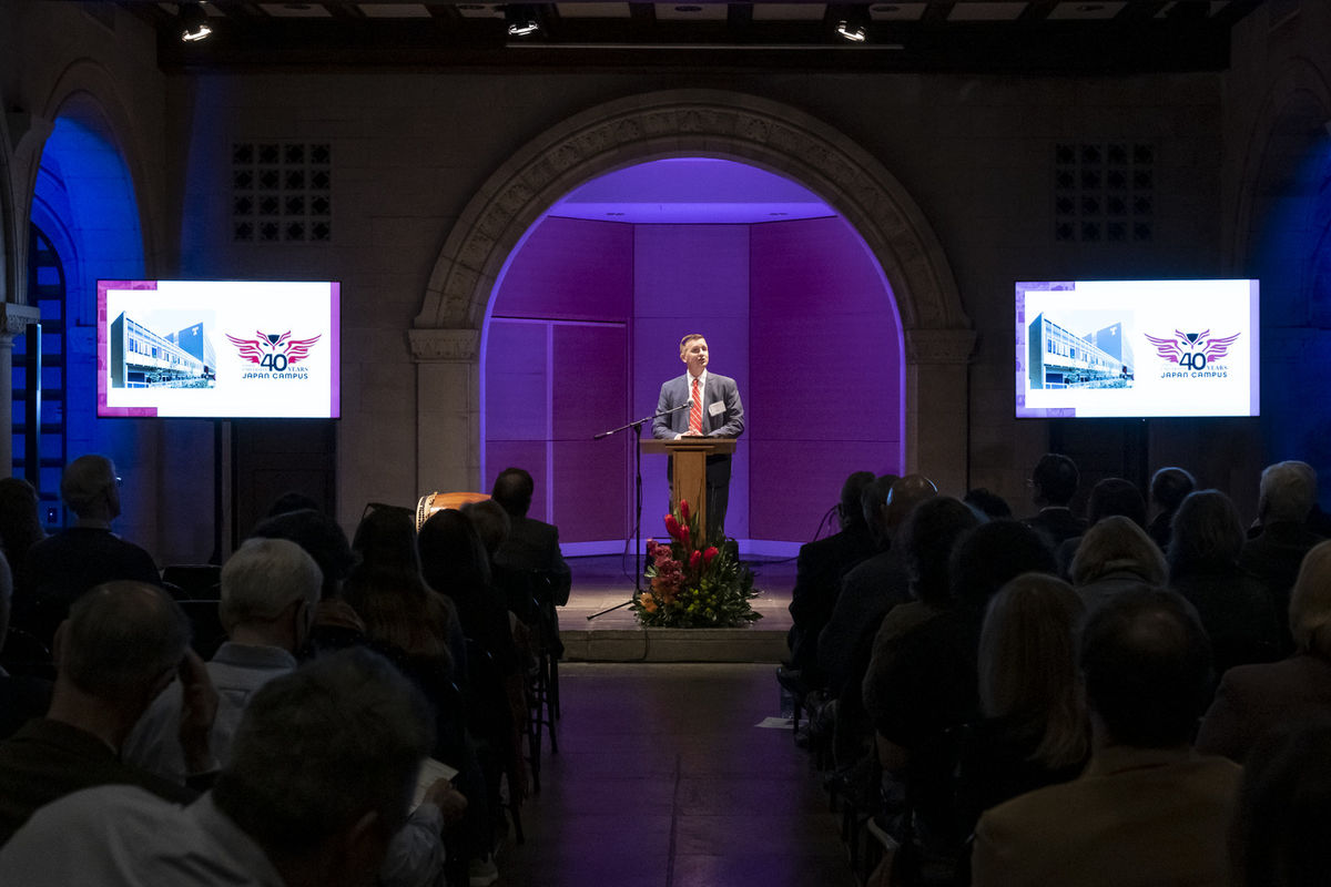 Temple Japan Dean Matthew Wilson speaking to a crowd