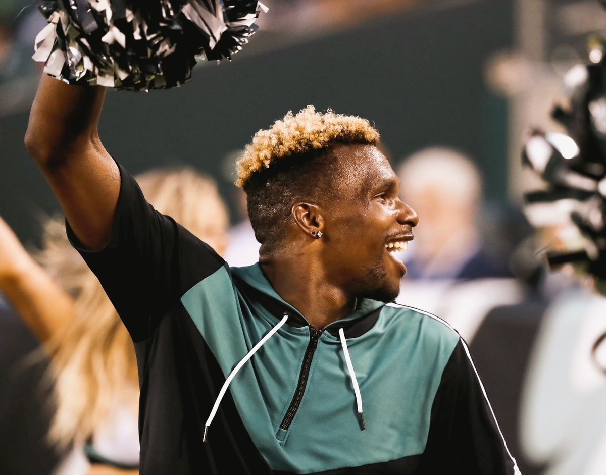Image of Eagles cheerleader and Temple student James LeGette.