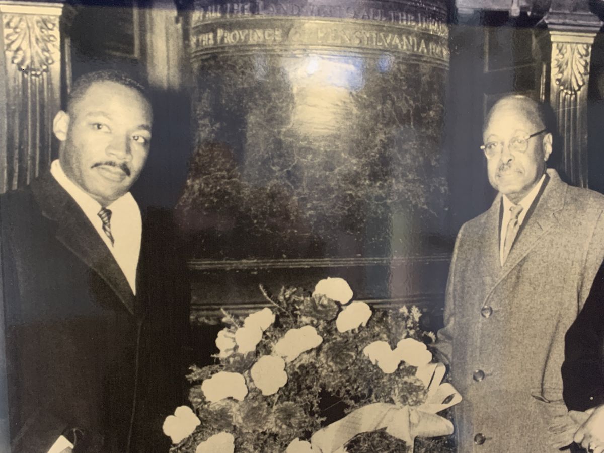 Image of Martin Luther King Jr. and Emmanuel Wright at the Liberty Bell on National Freedom Day.