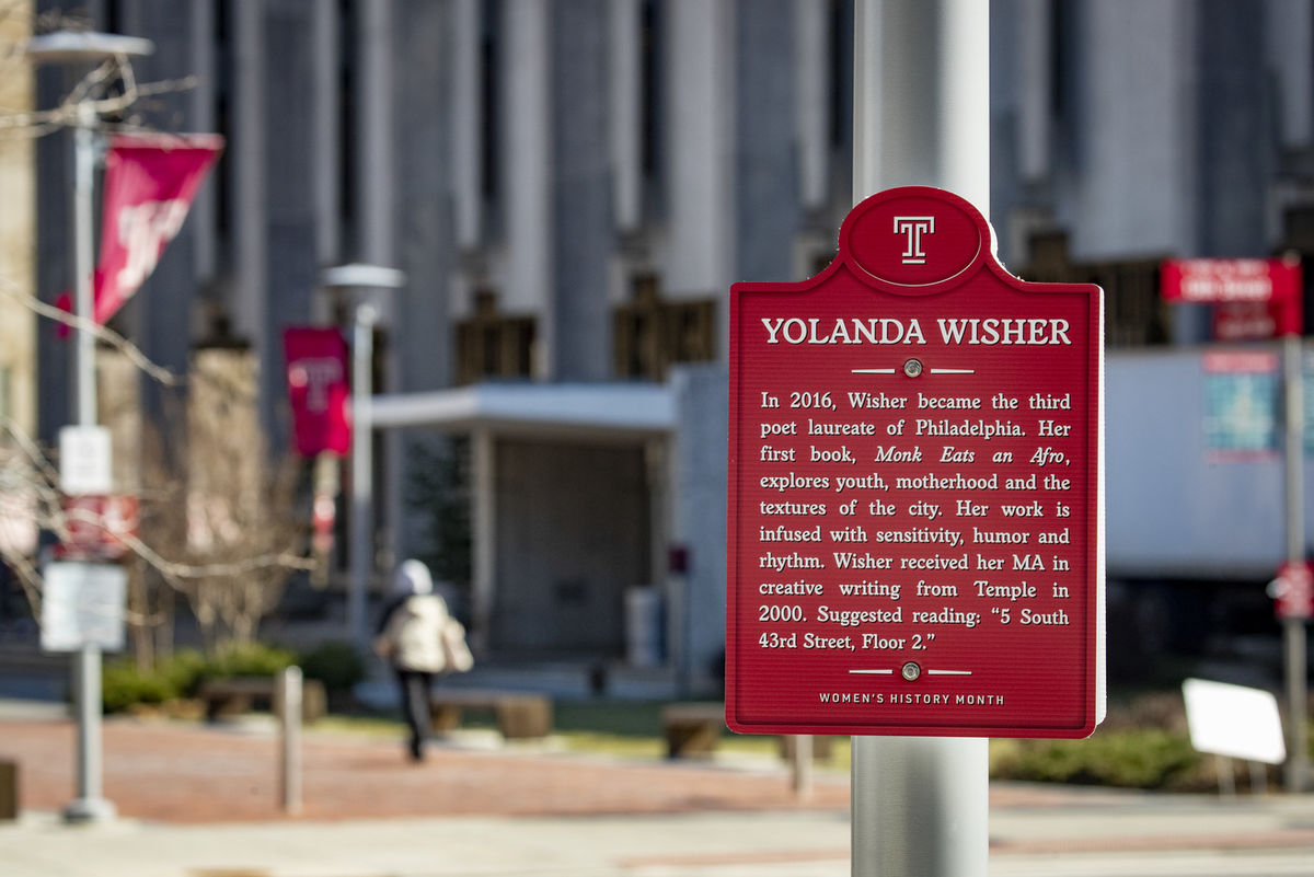 Yolanda Wisher plaque in front of the Bell Tower.