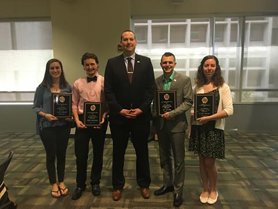 Student staff award recipients posing with their awards