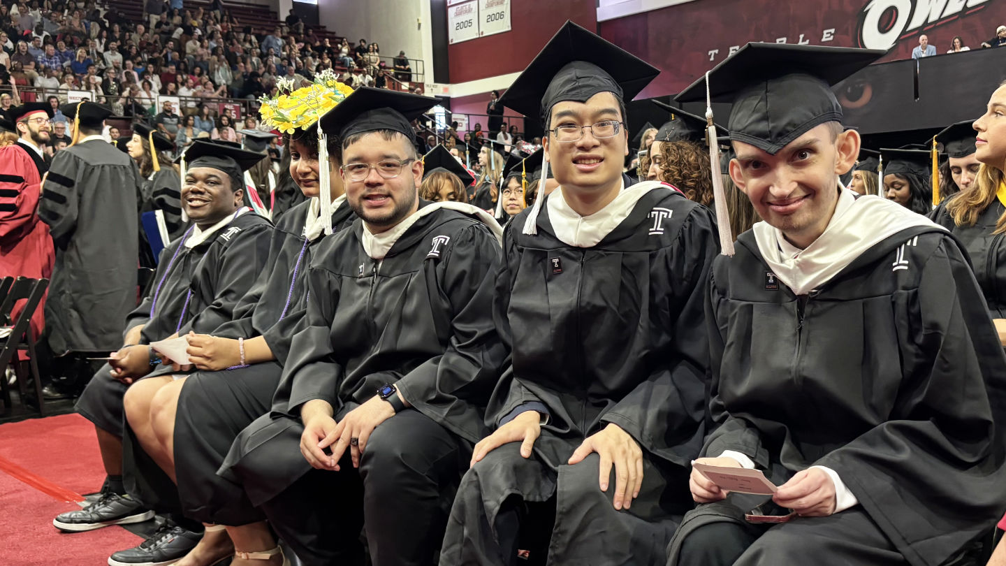 Leadership & Career Studies graduates Brian Williams, Mikayla Henry, Durand Delgado, Kevin Cheng, Pete Bulic pose in cap and gown at the College of Education and Human Development graduation