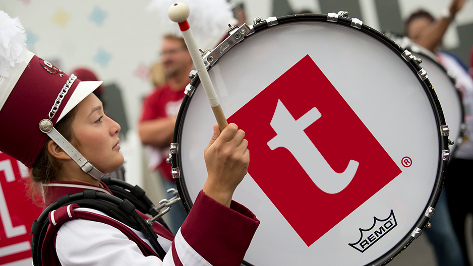 A drum that shows Temple’s updated lowercase “t” logo. 