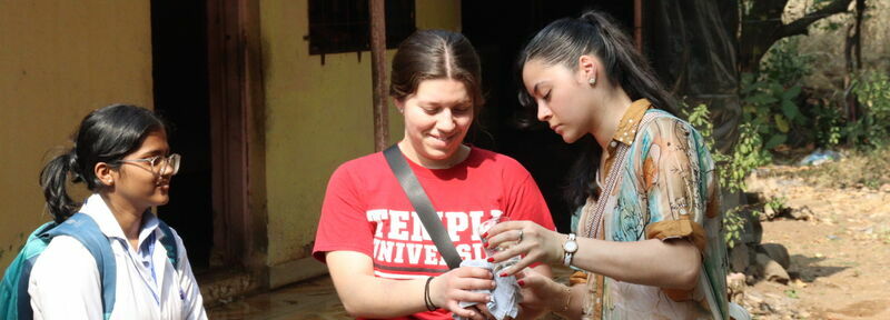 Temple and MGM students conducting a water treatment activity