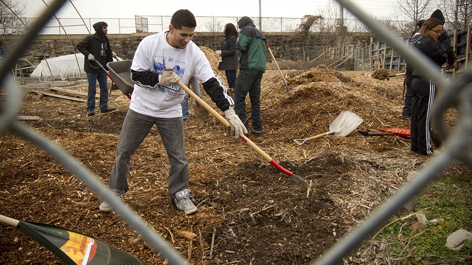 Students working in an urban garden. 