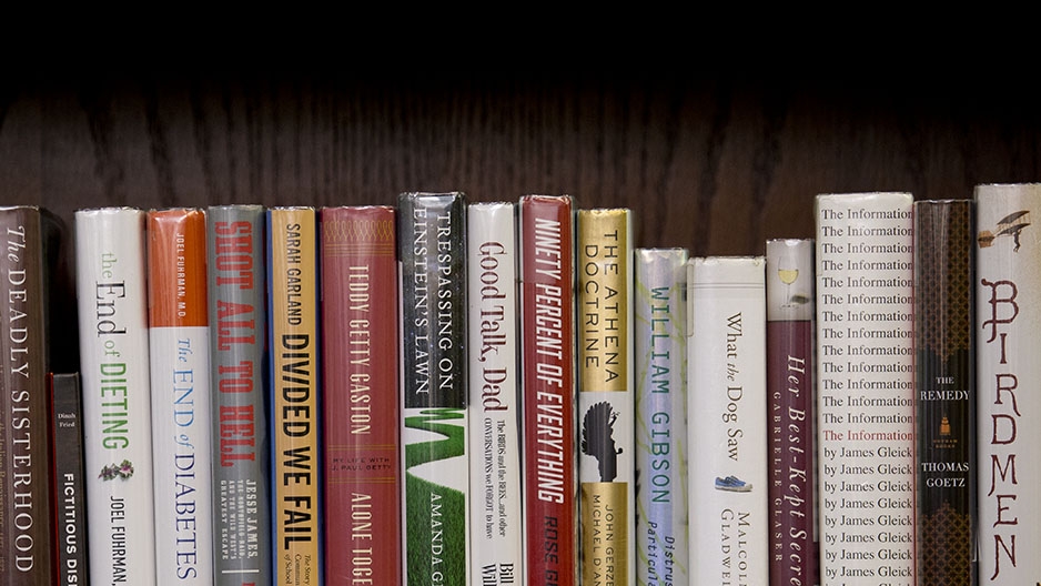 Books on a bookshelf in Samuel Paley Library. 